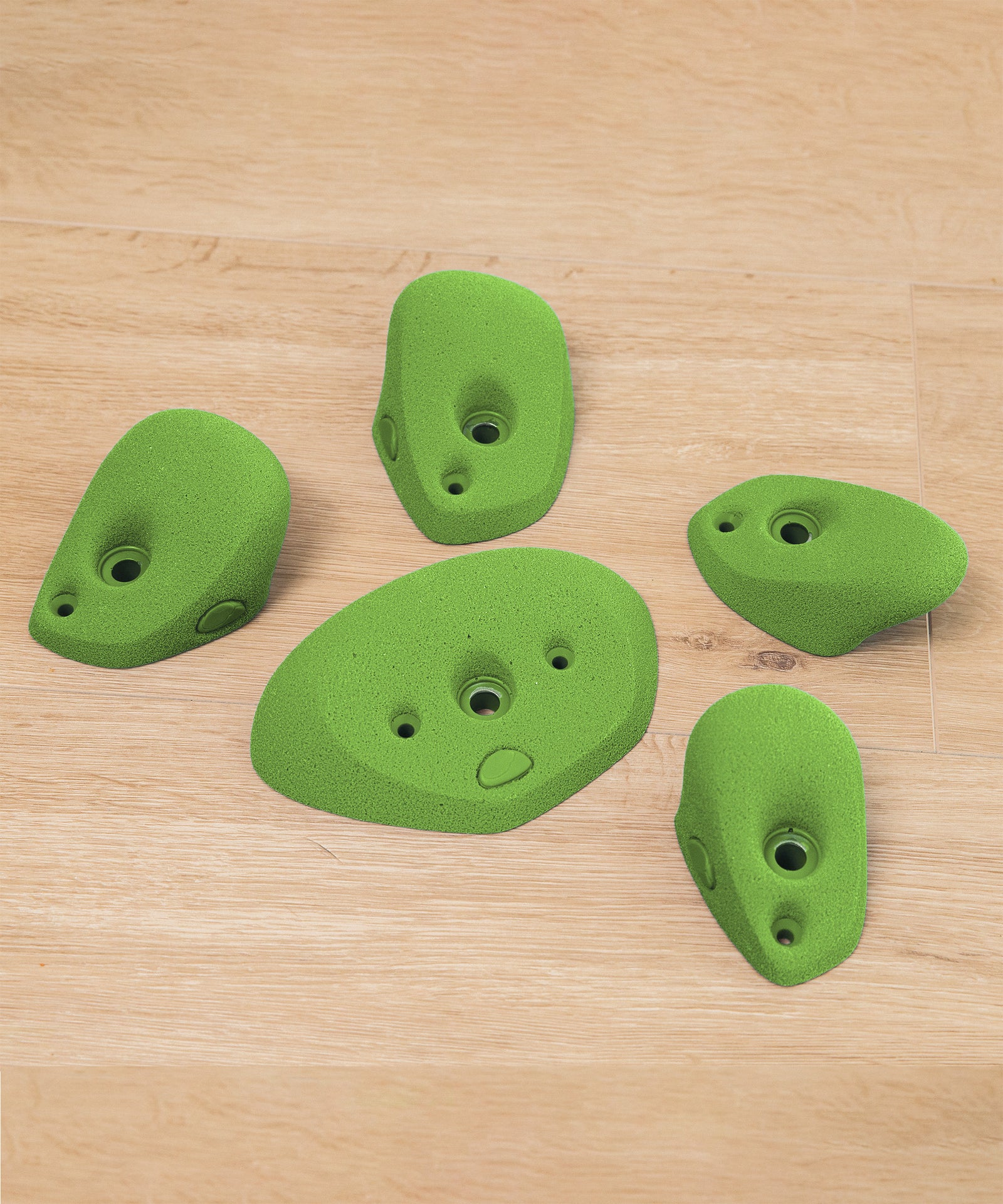 Nahaufnahme Klettergriffe grün.