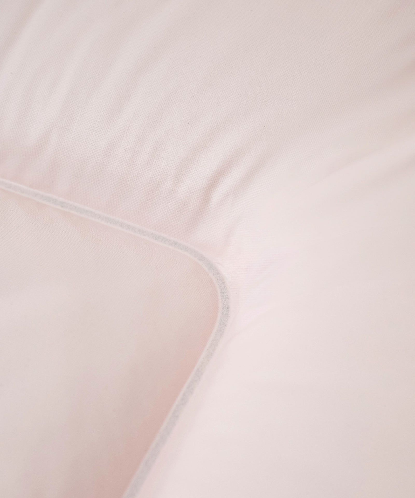 Zeitloses Design*Die Wickelauflage ist in verschiedenen uni- und gemusterten Designs erhältlich - passend zu jedem Einrichtungsstil und Geschmack.|Nahaufnahme Wickelauflage Rosé.