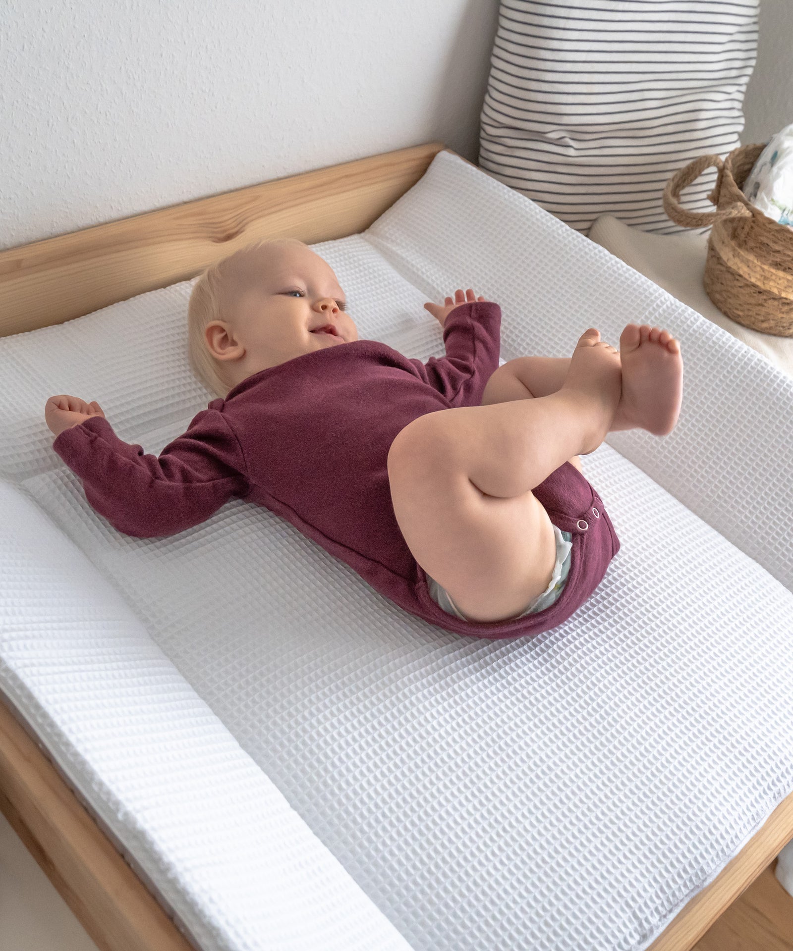 Für mehr Komfort*Durch die hochwertig verarbeiteten Steppungen entsteht eine praktische Wickelmulde, in der dein Baby sicher und weich gepolstert liegt.