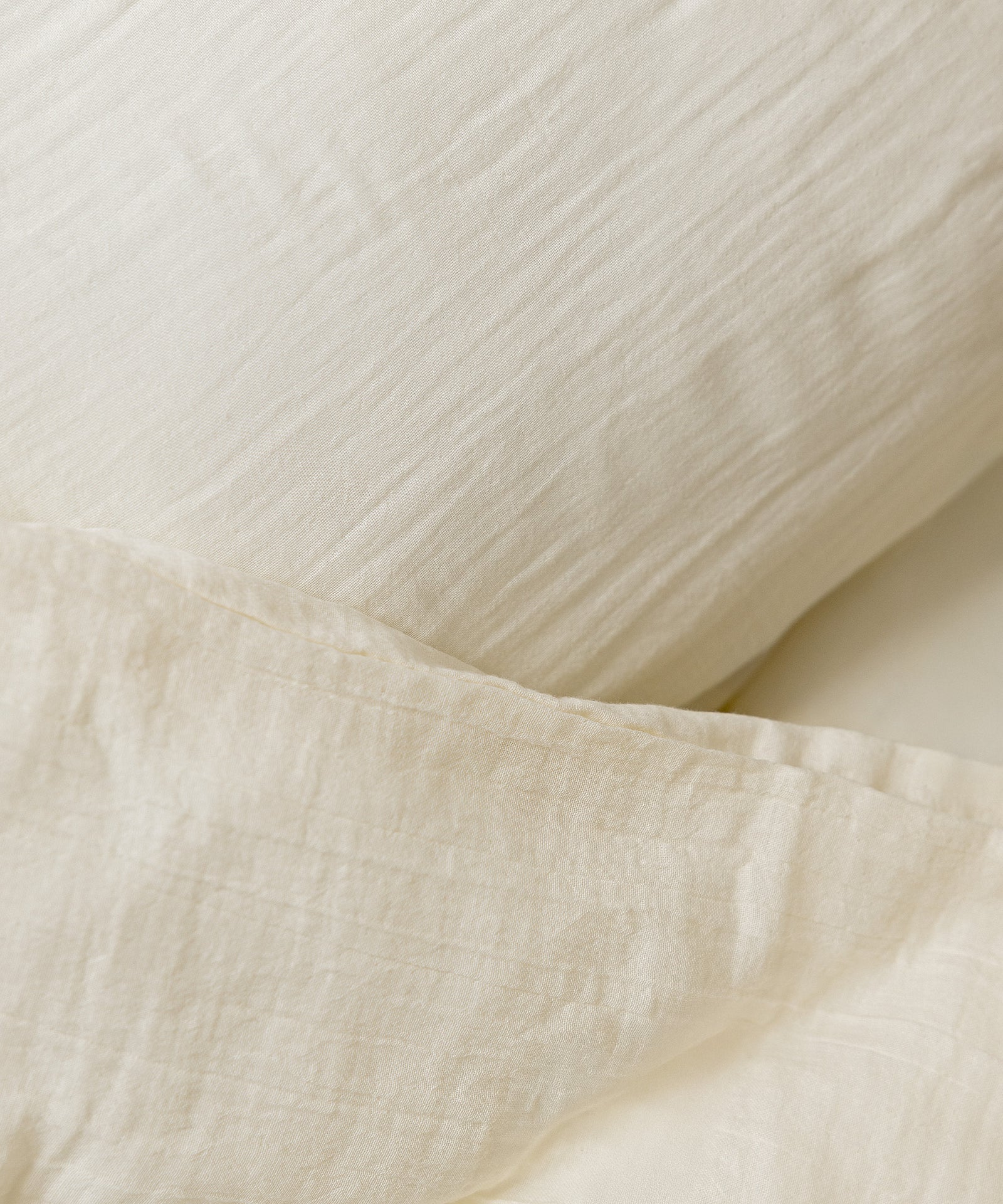 Nahaufnahme Bettwäsche Musselin Natur.
