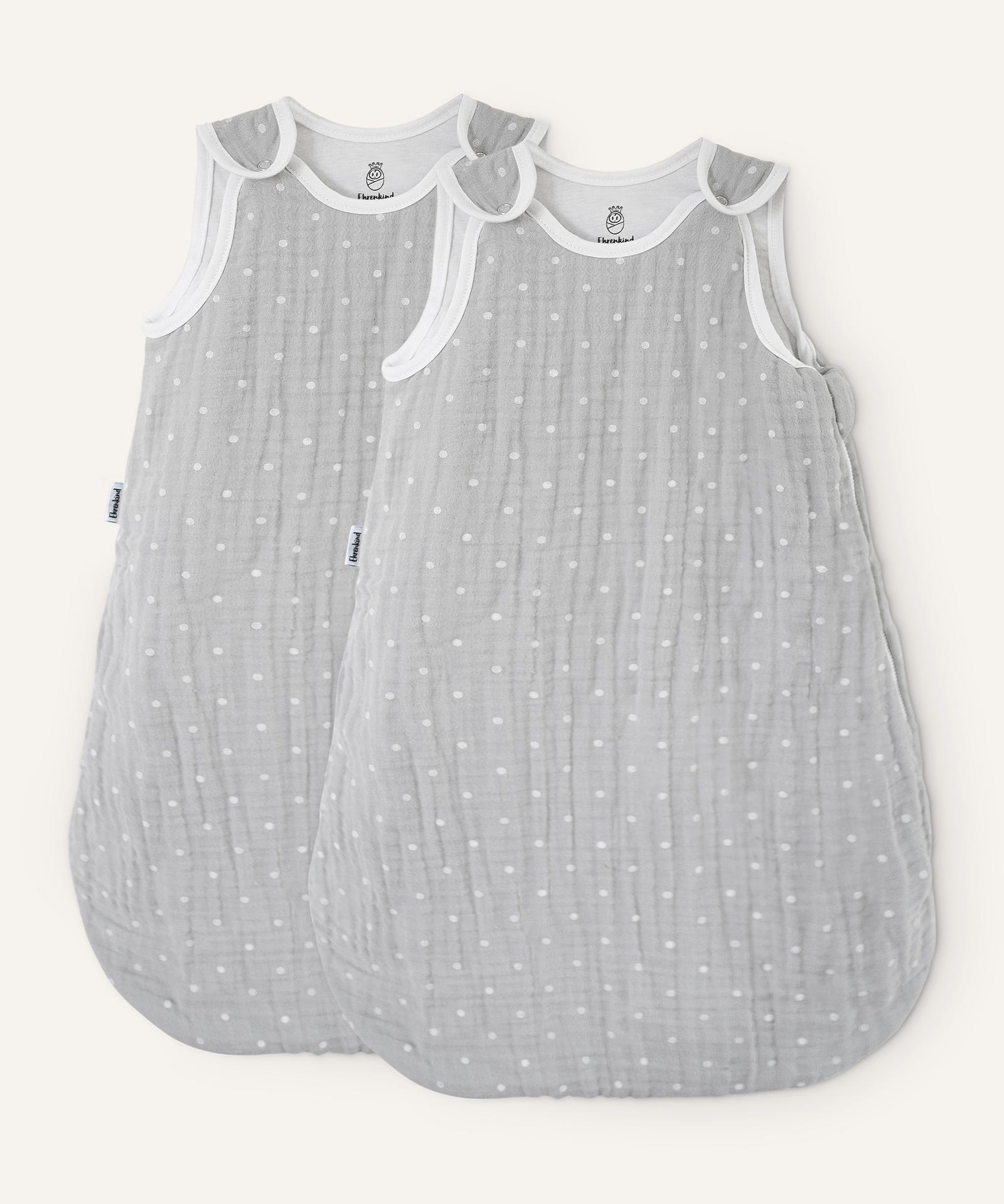Babyschlafsack Musselin grau mit weißen Tropfen.