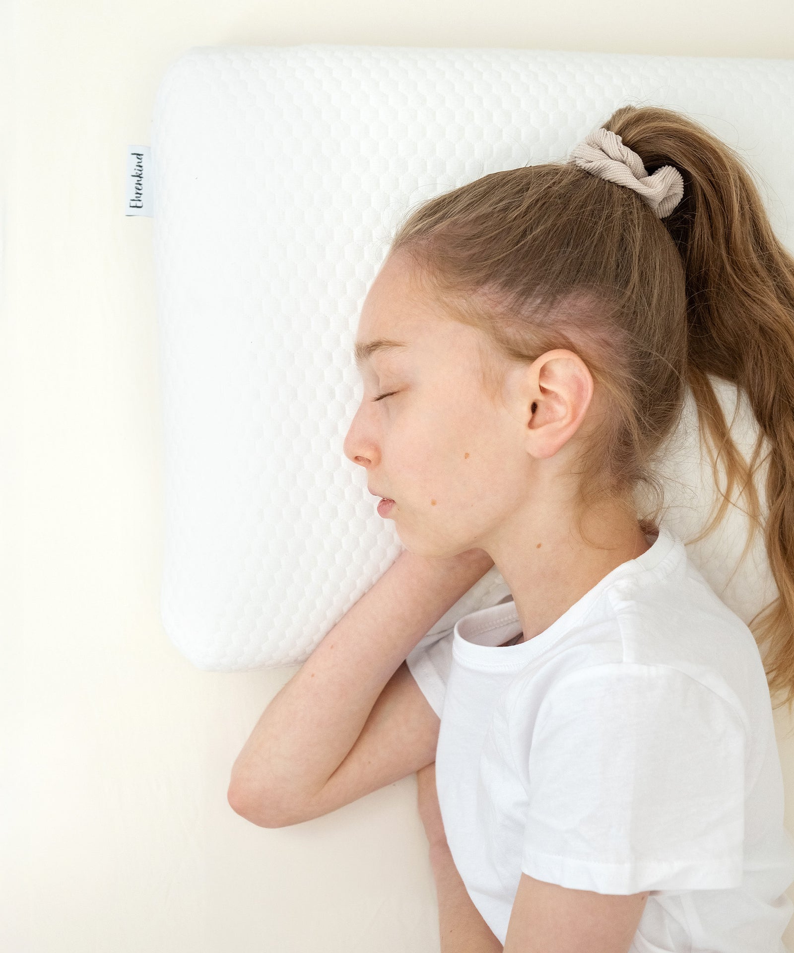 Ehrenkind Seitenschläferkissen.